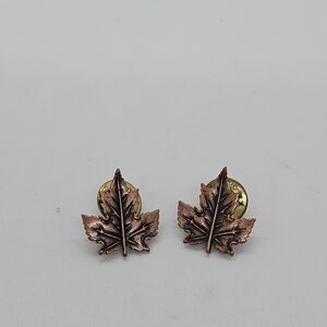 JJ J Jonette copper colored pair of maple leaf pins